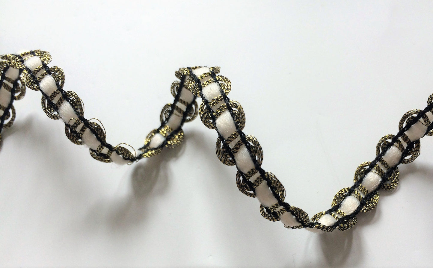 2 metres of white and gold trim